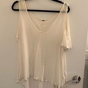 Flowy white free people shirt with open shoulder